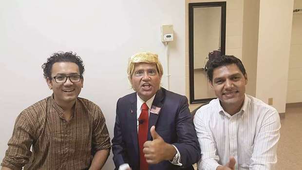 COMEDIAN: Manoj Gajurel, in the middle, in US President Donald Trumpu2019s get-up.