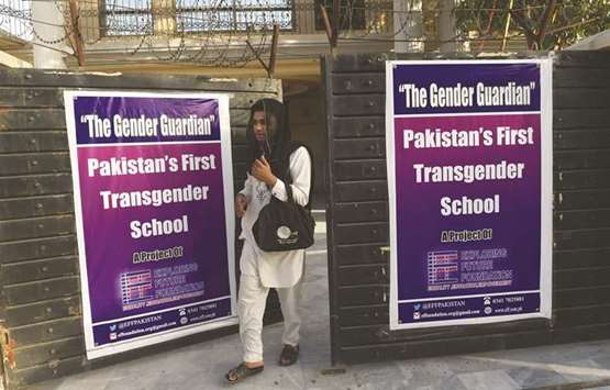 A student exits the first transgender school in Lahore after the first day of class.