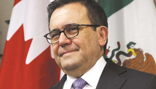 Mexican Economy Minister Ildefonso Guajardo poses for a photograph in Toronto. Mexico scored a separate commercial victory over the weekend with a deal in principle to update a 17-year-old free-trade agreement with the European Union. Guajardo has jetted to Brussels to help close the deal.
