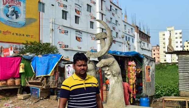 Mohammad Ibrahim, a garment worker union leader, is seen in front of the site of the former Rana Plaza garment complex in Savar, northwest of Dhaka.