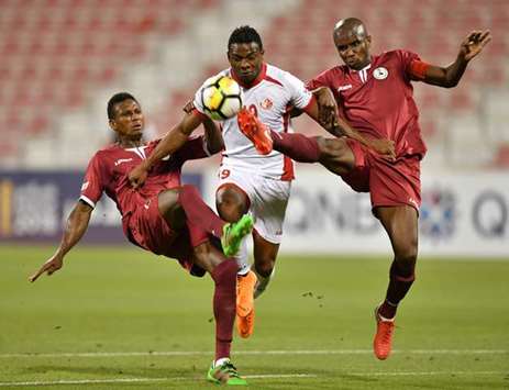 Action from the Emir Cup first round match between Al Markhiya (in maroon) and Al Shamal (in white) yesterday. PICTURES: Noushad Thekkayil