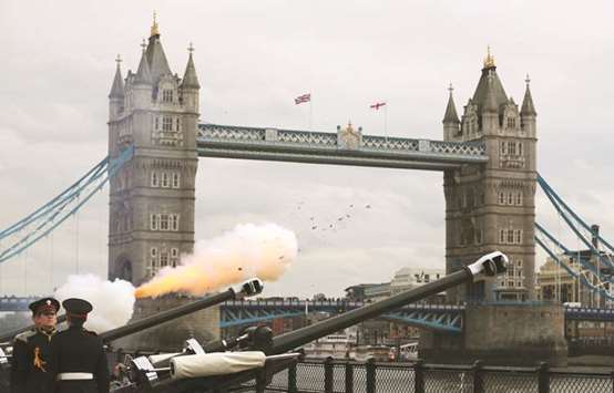 Members of the Honourable Artillery Company fire a 62 gun salute from the Tower of London to welcome the birth of Prince William and Catherine, the Duchess of Cambridgeu2019s third child, in London, yesterday.