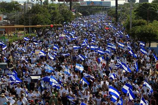 Demonstrators protest against police violence and the government of Nicaraguan President Daniel Ortega in Managua, Nicaragua.