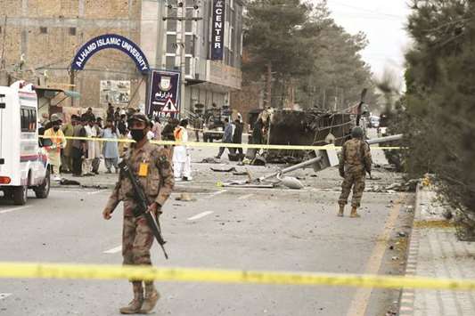 Security officials cordon off the site of one of the bombing attacks in Quetta yesterday.