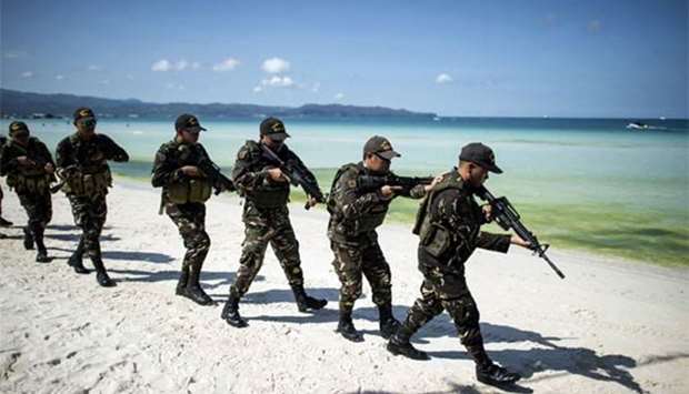 Policemen take part in a security exercise on the Philippine island of Boracay island on Wednesday.