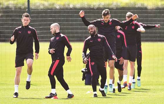 Arsenal players train ahead of the Europa League first leg semi-final against Atletico Madrid. (AFP)