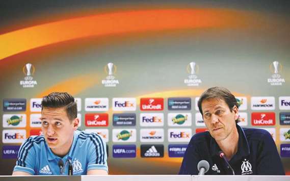 Marseille coach Rudi Garcia (right) and Florian Thauvin address a press conference in Marseille, France, yesterday. (Reuters)