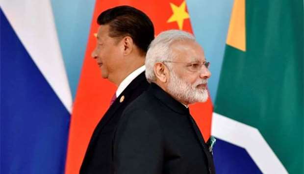 Chinese President Xi Jinping and Indian Prime Minister Narendra Modi are seen during the BRICS Summit in Xiamen in  September last year.