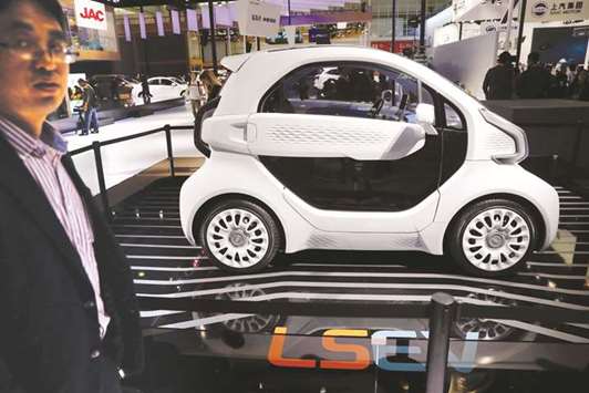 A LSEV electric car is displayed during a media preview of the Auto China 2018 motor show in Beijing. Global carmakers touted their latest electric and SUV models in Beijing as they warily welcomed Chinau2019s promise of better foreign access to the worldu2019s largest auto market, where domestic vehicles are making major inroads. Industry behemoths like Volkswagen, Daimler, Toyota, Nissan, Ford and others are displaying more than 1,000 models and dozens of concept cars at the auto show.