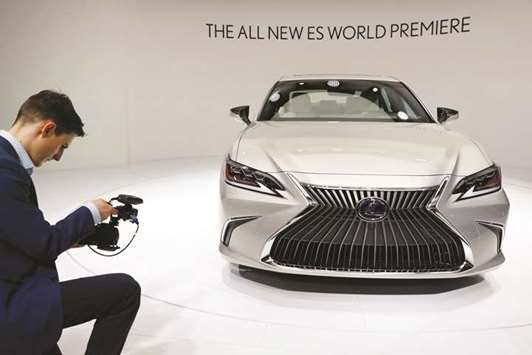 The new Lexus ES is displayed during a media preview of the Auto China 2018 motor show in Beijing on Wednesday. Lexus said it is increasing its focus on China, unveiling a redesign of its popular ES sedan at the Beijing Auto Show.