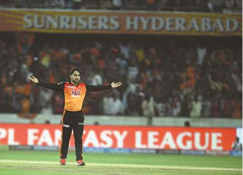Sunrisers Hyderabadu2019s Rasid Khan celebrates after taking the wicket of Kings XI Punjabu2019s R.Ashwin (not in the picture) during their IPL match in Hyderabad yesterday. (AFP)