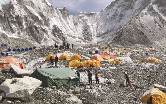 Trekkers and porters gather at Everest Base Camp, some 140km northeast of the Nepali capital Kathmandu.
