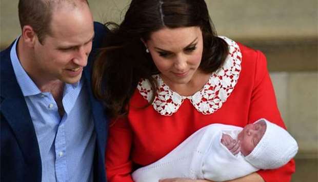 Prince William and Kate are seen with their new son in London last week.