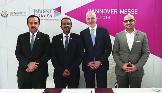 Officials of the MEC and the Dutch company HERE Global at the signing ceremony in Hanover, Germany.