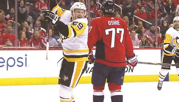 Jake Guentzel of the Pittsburgh Penguins celebrates his game-winning goal against the Washington Capitals in Game One of the Eastern Conference second round natch at the NHL Stanley Cup Playoffs at the Capital One Arena in Washington, DC. (AFP)