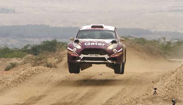 Nasser Saleh al-Attiyah on his way to a 4min 20.9sec lead after five slippery gravel stages in Jordan.