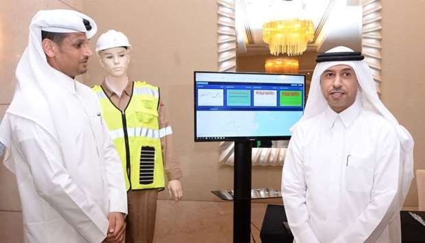 HE the Minister of Administrative Development, labour and Social Affairs Dr Issa Saad al-Jafali al-Nuaimi launching the ,smart jacket, for workers.