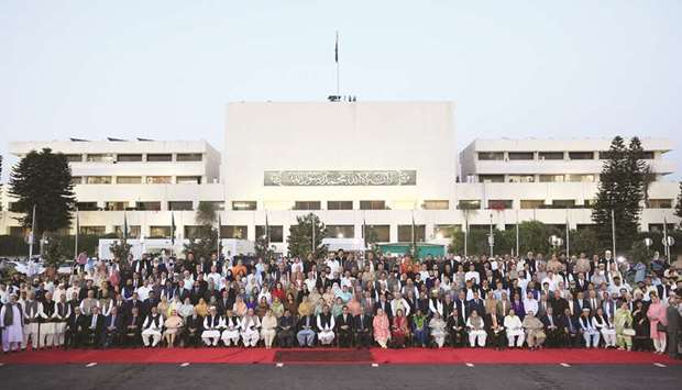 Outgoing parliamentarians pose for a group photo after the National assembly session to present 2018/19 budget in Islamabad. The infrastructure sector has been  allotted Rs575bn or 62% of the proposed budget, social sector has been allotted Rs135bn or 14%, science and technology has been allotted Rs12bn or 1%