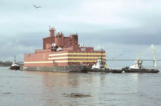 The floating nuclear power plant u2018Akademik Lomonosovu2019 is seen being towed to an Atomflot base in Murmansk for nuclear fuel loading, in Saint Petersburg.