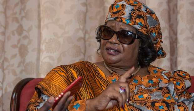 Malawi's former president Joyce Banda speaks to journalists yesterday in the VIP lounge of the Chileka International Airport in Blantyre, southern Malawi, after returning from self-imposed exile.
