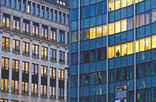 Offices of official European Union buildings are pictured at dusk in central Brussels. From slashed farm funds that will anger French farmers, to development cash tied to respect for democracy, and demands for greater national contributions, the 2021-2027 European Union budget promises to be an explosive mixture.