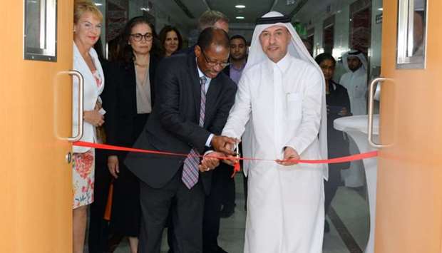 Qataru2019s Administrative Development, Labour and Social Affairs Minister HE Dr Issa Saad al-Jafali al-Nuaimi (right) and Moussa Oumarou lead the inauguration of the ILO Doha office at Qatar Tower. PICTURE: Thajudeen