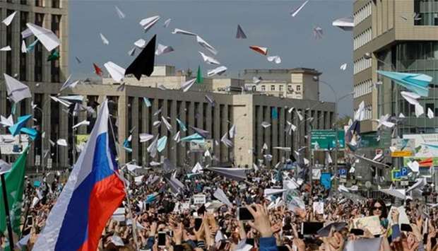 People release paper planes, symbol of the Telegram messenger, during a rally in Moscow in April this year. 