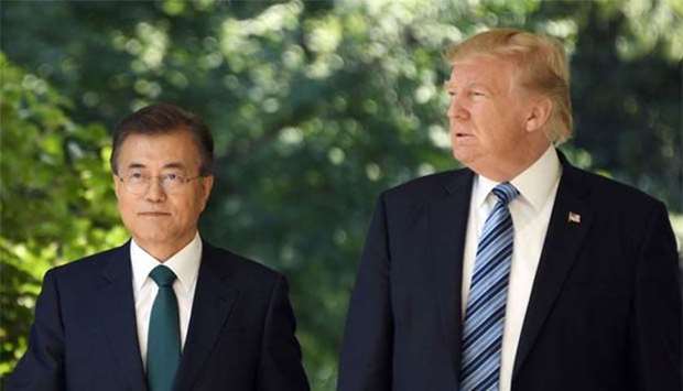South Korean President Moon Jae-in (left) is seen with US President Donald Trump in this file picture.