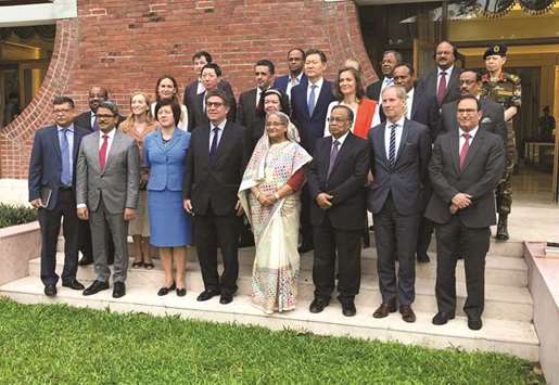 UN Security Council envoys pose for a photograph with Bangladeshi Prime Minister Sheikh Hasina after their meeting in Dhaka yesterday.