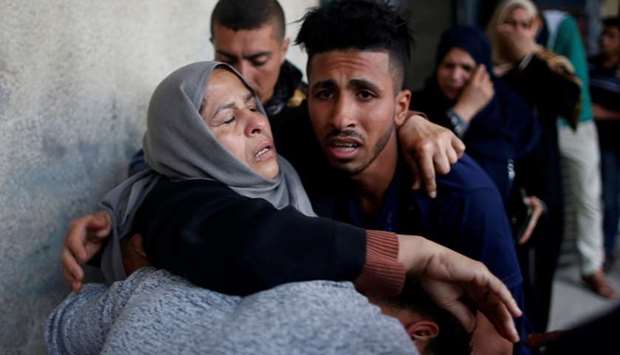 The mother of Palestinian who was killed along Israel border with Gaza, reacts at a hospital in the central Gaza Strip