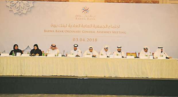 Sheikh Mohamed and other directors at the Barwa Bank AGM at the Four Seasons in Doha yesterday.