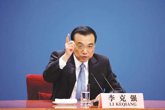 Chinese premier Li Keqiang speaks at a news conference in Beijing. With regard to trade imbalances, China and the US should adopt a pragmatic and rational attitude, promote balancing through expansion of trade, and stick to negotiations to resolve differences and friction, Li said.
