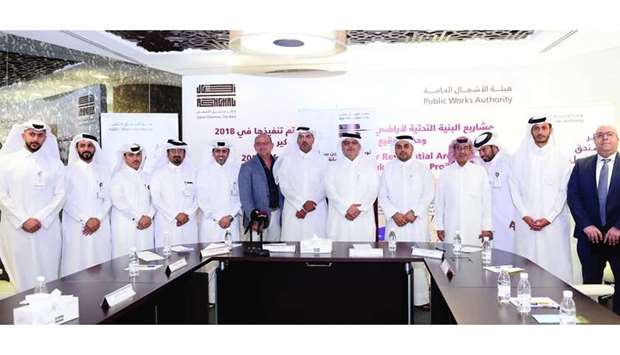Saad bin Ahmed al-Muhannadi and other Ashghal officials with representatives of companies that were 