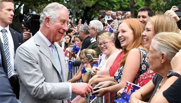 Prince Charles is greeted by the public during a visit to Brisbane on Wednesday.