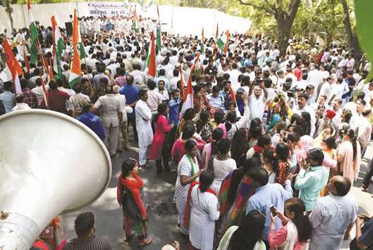 Congress Party activists gather during a demonstration in New Delhi yesterday against a Supreme Court order that allegedly diluted the Scheduled Castes and Scheduled Tribes (Prevention of Atrocities) Act.