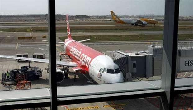 A Scoot plane takes off at Changi Airport Terminal 4.