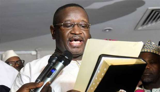 Opposition candidate and former military junta leader Julius Maada Bio takes his oath as Sierra Leone's new president in Freetown on Wednesday.