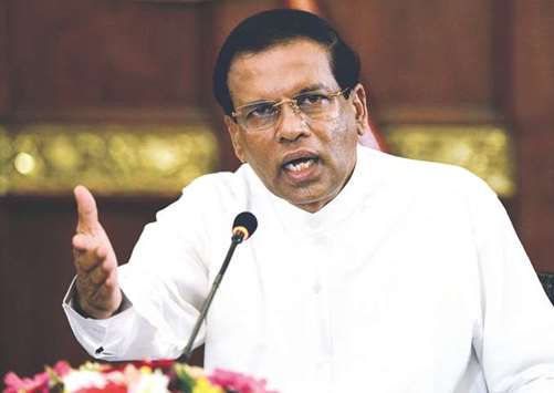 In this file photo, Sri Lankan President Maithripala Sirisena addresses a press conference in Colombo.