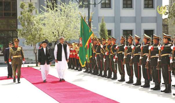 President Ghani and Prime Minister Abbasi inspect the honour guard at the presidential palace in Kabul.