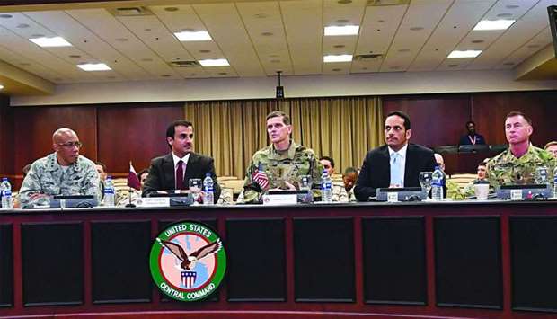 His Highness the Emir Sheikh Tamim bin Hamad al-Thani and HE the Deputy Prime Minister and Foreign Minister Sheikh Mohamed bin Abdulrahman al-Thani with the Commander of US Centcom Joseph Votel (centre), the Deputy Commander Lieutenant General Charles Brown (left) and Centcom Chief of Staff  Major General Terry Ferrell (right) at MacDill Air Force Base.