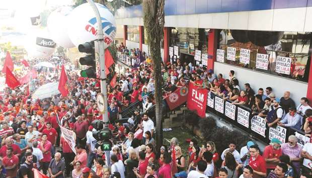 Supporters of former president Luiz Inacio Lula da Silva protest against court sentence in Sao Bernardo do Campo, Brazil, yesterday.