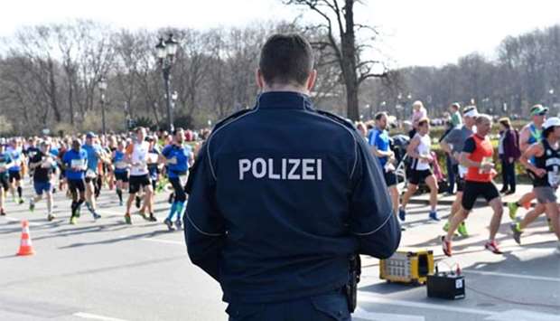 Police patrol during the half-marathon in Berlin on Sunday.