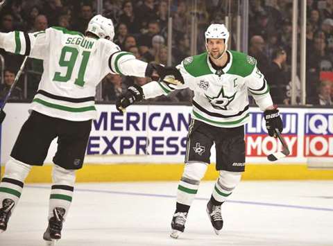 Dallas Stars left wing Jamie Benn (right) celebrates with centre Tyler Seguin after his third goal of the NHL game against the Los Angeles Kings. PICTURE: USA TODAY Sports