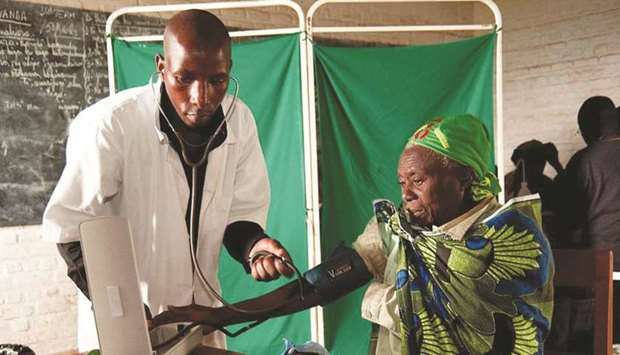 A Mobile Health Care Clinic in Rwanda. The world needs universal health coverage; but to achieve it, the worldu2019s health sector must undergo treatment of its own.