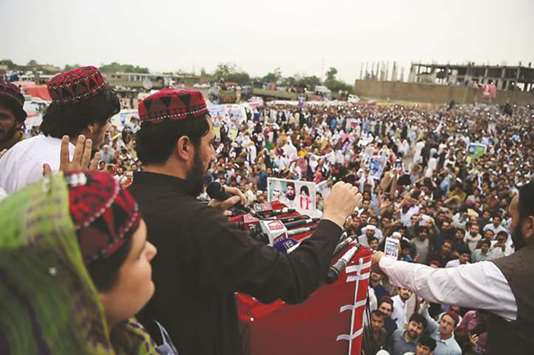 Demonstrators of Pashtun Protection Movement gather at a public rally in Peshawar yesterday.