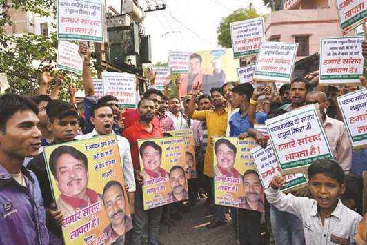 Protesters stage a demonstration against Bharatiya Janata Party MP from Patna Sahib, Shatrughan Sinha, in Patna yesterday.