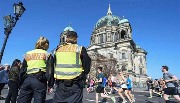 Police patrol during the half-marathon in Berlin on Sunday.