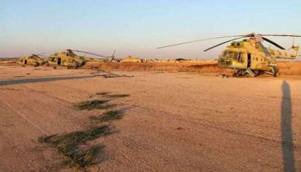Helicopters seen parked at the T-4 military airport , Homs