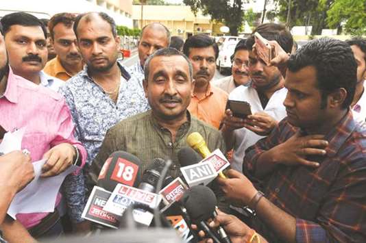 BJP legislator from Unnao, Kuldeep Singh Sengar, speaks to reporters after meeting Uttar Pradesh Chief Minister Yogi Adityanath in Lucknow yesterday. Sengar was accused by a woman of raping her.