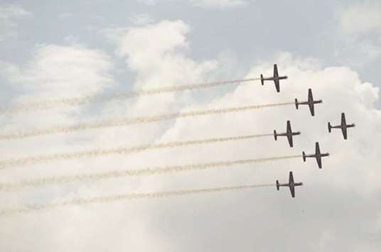 Indonesia Air Force aerobatic teams perform formation fly-by at the Halim Perdanakusuma Base in Jakarta. Indonesiau2019s Air Force celebrates its 72th anniversary on April 9.